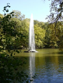 A unique snake fountain rising high above the water, in the most beautiful park. Uman Ukraine