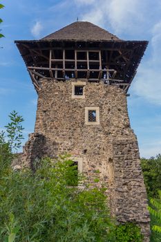 partially restored tower of a magnificent neviitskogo castle on a mountain near the river Tisza. Uzhhorod Ukraine