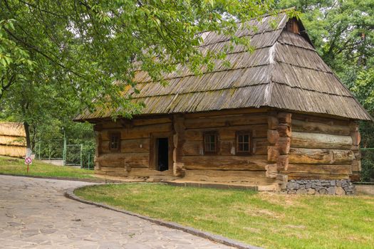 Traditional Ukrainian log cabin with wooden roof