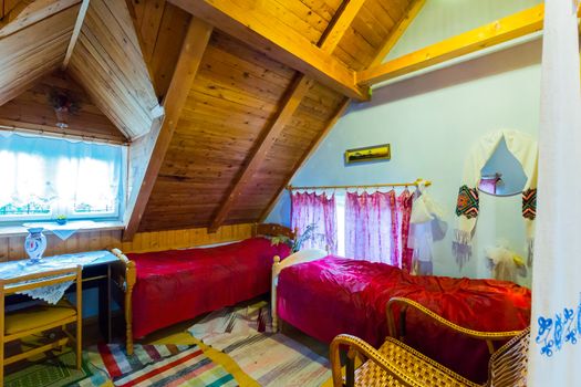 A room with several sleeping places in the traditional Ukrainian style