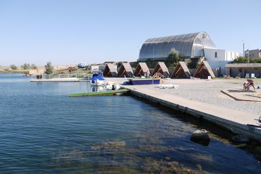 Quay of a small beach with a canopy for rest