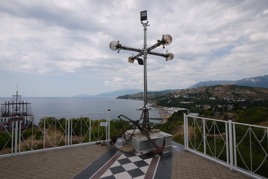 lantern near the temple in the Crimea on the background of the black sea