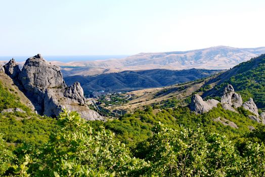 The village is surrounded by beautiful mountains in the background of the boundless sea