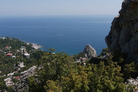 a small cozy coastal town on the background of the boundless Black Sea