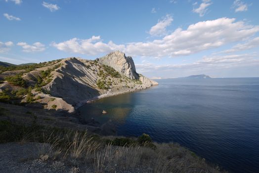 beautiful Crimean slopes on the shore of the Chanoe sea.Tipping on the beach