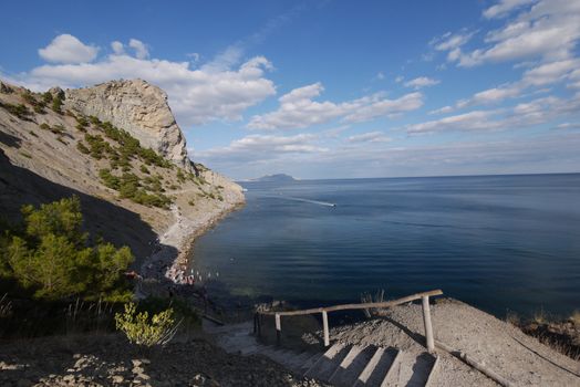 beautiful Crimean slopes on the shore of the Chanoe sea.Tipping on the beach