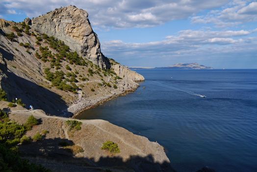 the bay of the black sea against the background of the Crimean mountains. Walking on a boat