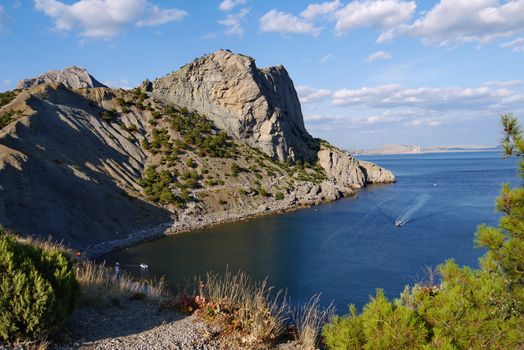 the bay of the black sea against the background of the Crimean mountains. Walking on a boat