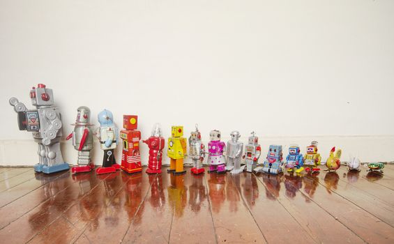 a line of vintage robots from small to big 