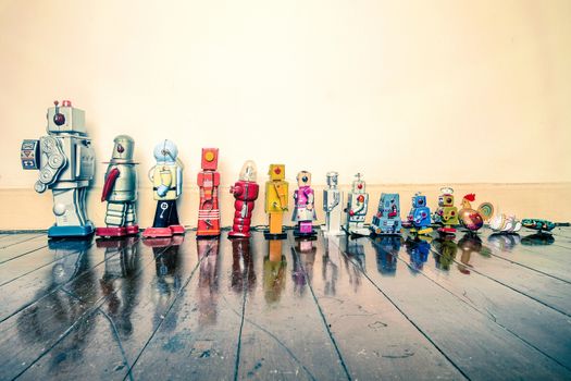 a line of vintage robots from small to big 