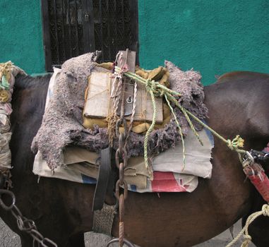 close-up of old cart horse saddle     