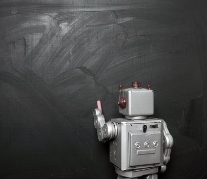 Blackboard copy space with teacher retro robot 