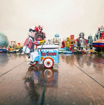 toy ice cream cart on wooden floor