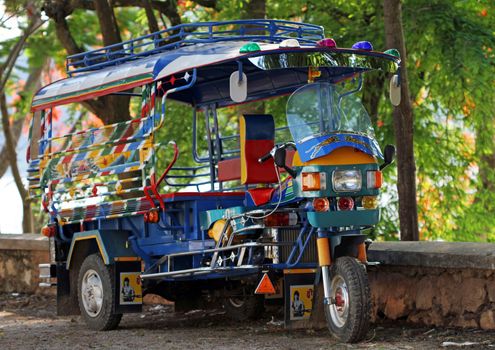  tuktuk parked in laos