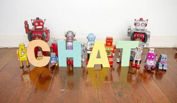 the word Chat with vintage robot toys 