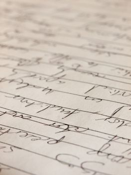 close up angled texture and detail of a notebook written in