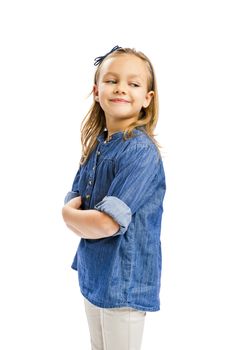 Studio portrait of a cute blonde girl, isolated in white background