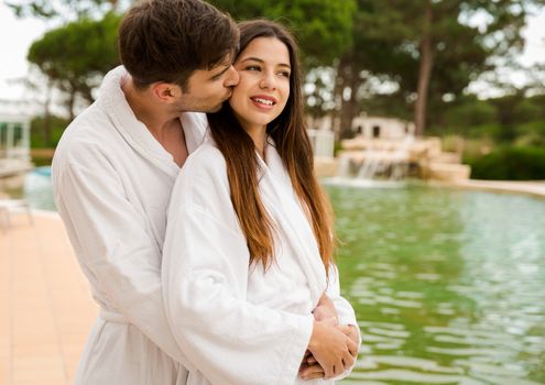 Young couple enjoying vacations in a hotel