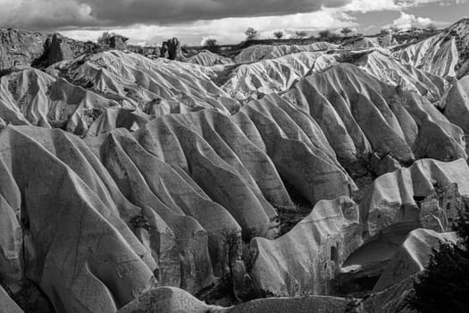 Beautiful stone cliffs in valley named Rose valley near Meskendir, Goreme, Turkey