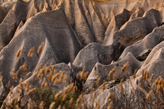 Beautiful stone cliffs in valley named Rose valley near Meskendir, Goreme, Turkey