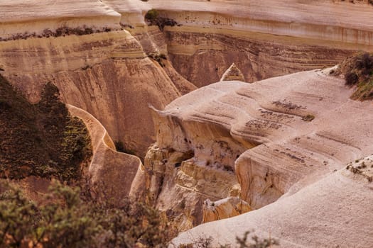 Beautiful stone cliffs in valley named Rose valley near Meskendir, Goreme, Turkey