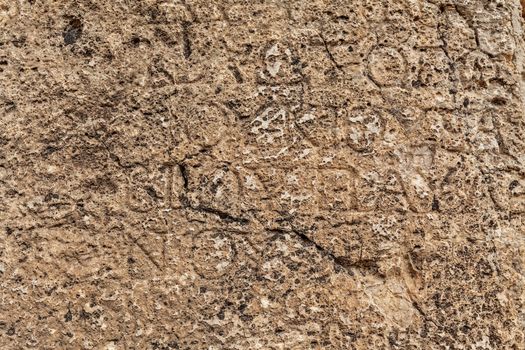 Texture of stone plate with inscriptions in ancient city Hierapolis