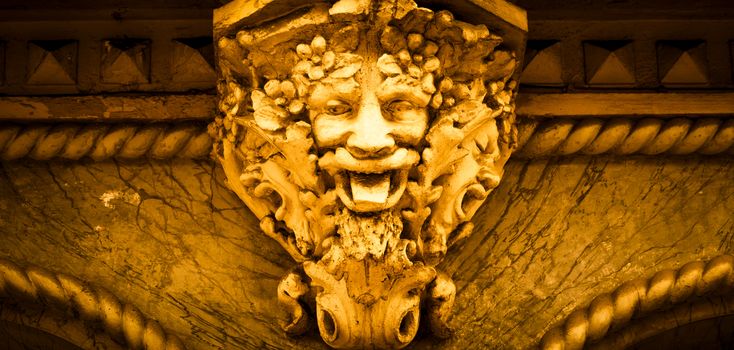 Italy, Turin. This city is famous to be a corner of two global magical triangles. This is a protective mask of stone on the top of a luxury palace entrance, dated around 1800