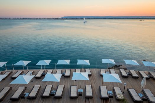 Syracuse, Isle of Sicily, Italy. Sunset in front of the sea at the end of a spring day in May.