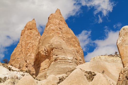 Beautiful stone cliffs in valley named Rose valley near Meskendir, Goreme, Turkey
