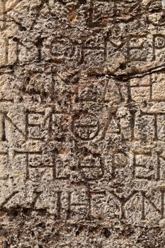 Texture of stone plate with inscriptions in ancient city Hierapolis