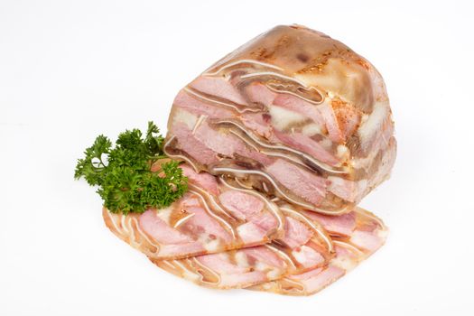 Meat and greenery on an isolated studio background