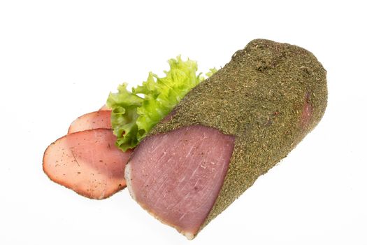 Meat and greenery on an isolated studio background