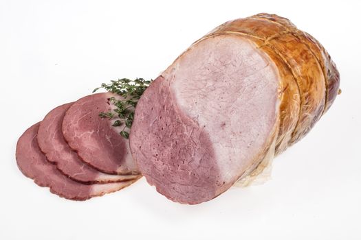 Pieces of ham on an isolated tudio background