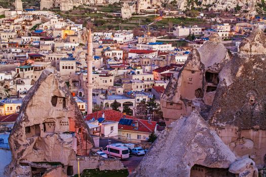 Cylindrical stone cliffs and cave houses in Goreme, Turkey