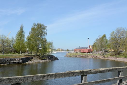 View from footbridge on Suomenlinna island towards the dry dock and shipyard