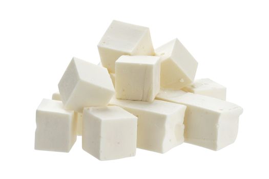 Greek feta cubes. Diced soft cheese isolated on white background with clipping path