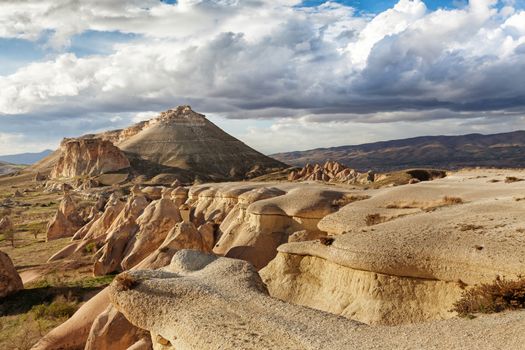 Beautiful stone cliffs in valley named Rose valley near Meskendir, Goreme, Turkey