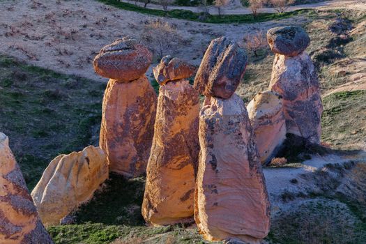 Cylindrical stone cliffs and cave houses near Goreme, Turkey