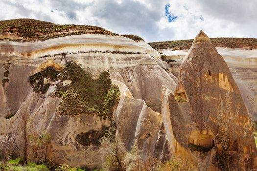 Beautiful stone cliffs in valley named Rose valley near Meskendir, Goreme, Turkey