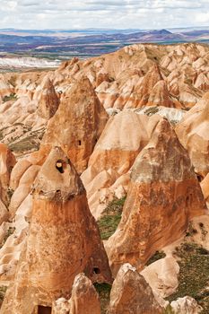 Beautiful stone cliffs in valley named Rose valley near Meskendir, Goreme, Turkey