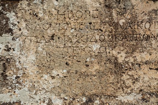 Texture of stone plate with inscriptions in ancient city Hierapolis