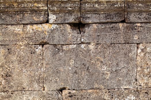 Texture of stone wall in ancient city Hierapolis, near Pamukkale, Turkey