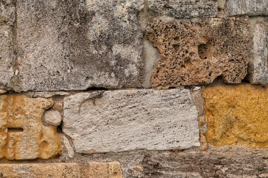 Texture of stone wall in ancient city Hierapolis, near Pamukkale, Turkey