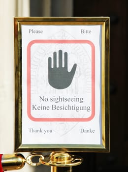 Warning sign during a mass in a church in Zurich