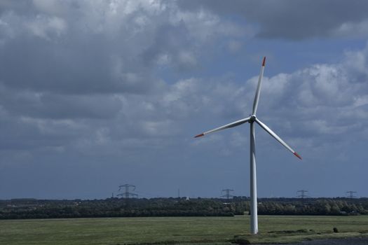 Stock pictures of windmills to produce clean energy