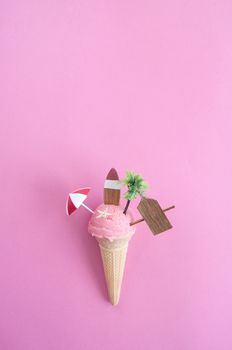 Beach sign, parasol, surfboard and pine tree inside a strawberry icecream cone with background space