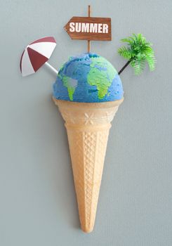 Ice cream cone with atlas map and vacation items including beach post, parasol and palm tree