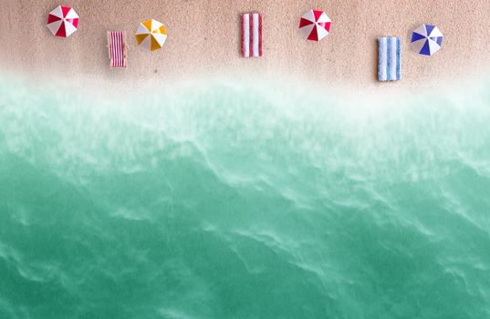 Miniature beach parasols and towels 