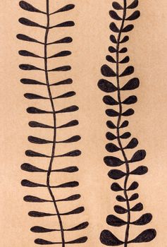 Photo of a floral ornament drawn by hand with black pen.