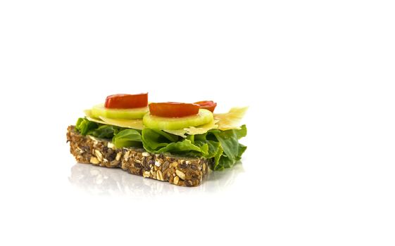 healthy breakfast or lunch with bread with cucumber salade tomato and cheese isolated on white background